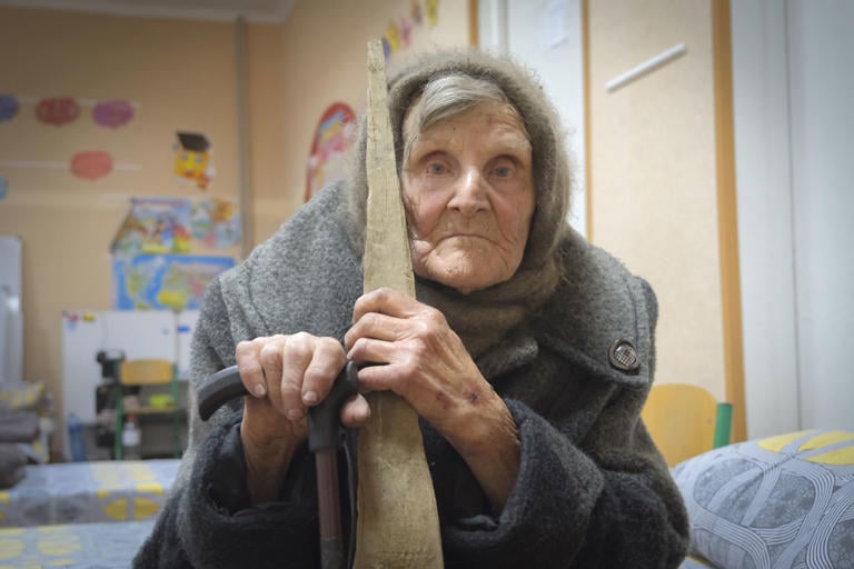 98 Year-Old Walks Through Battle Zone to Safety
